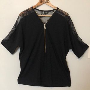 Beautifully designed open lace sleeved blouse.